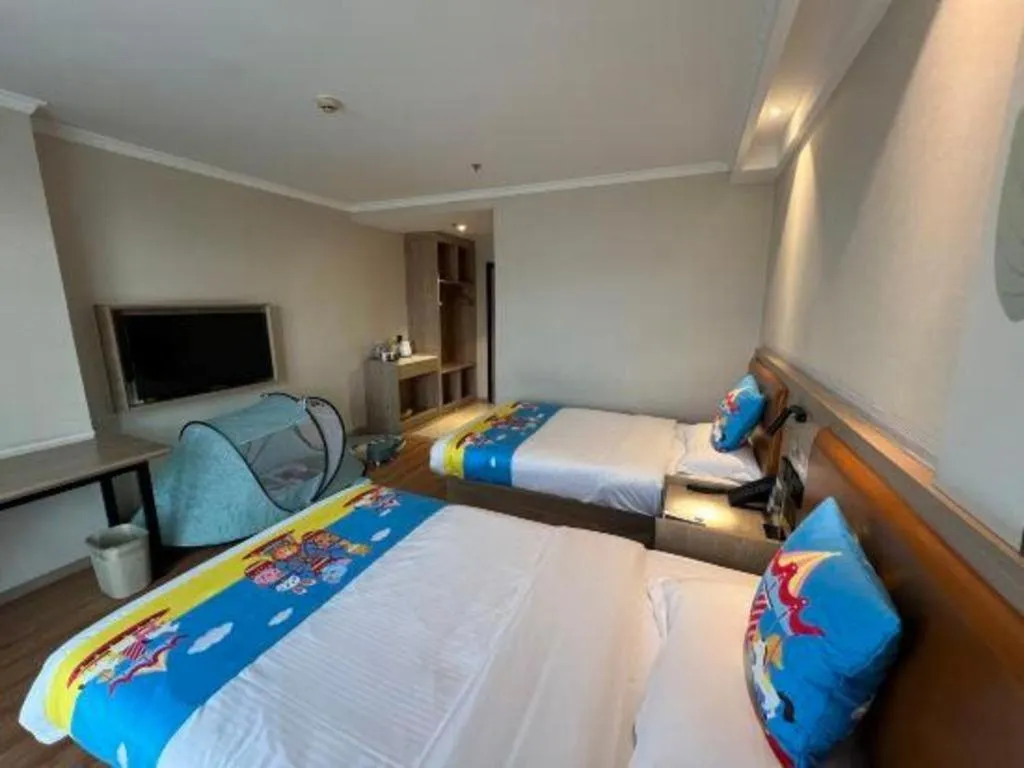 Bed in GreenTree Inn Xuzhou High Speed Railway Station Express Hotel