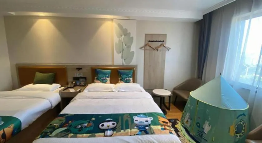 Bed in GreenTree Inn Xuzhou High Speed Railway Station Express Hotel