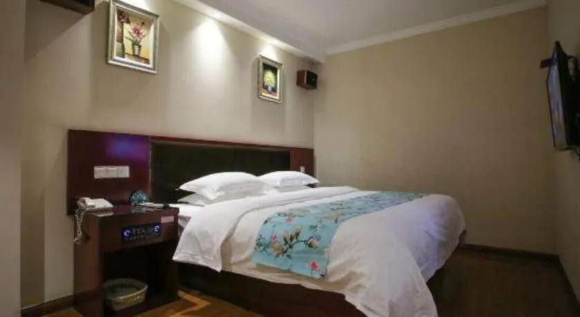 Bed in GreenTree Inn Jiangsu Wuxi Xishan DongTing Erquan East Road XinGuang Newly Estate Express Hotel