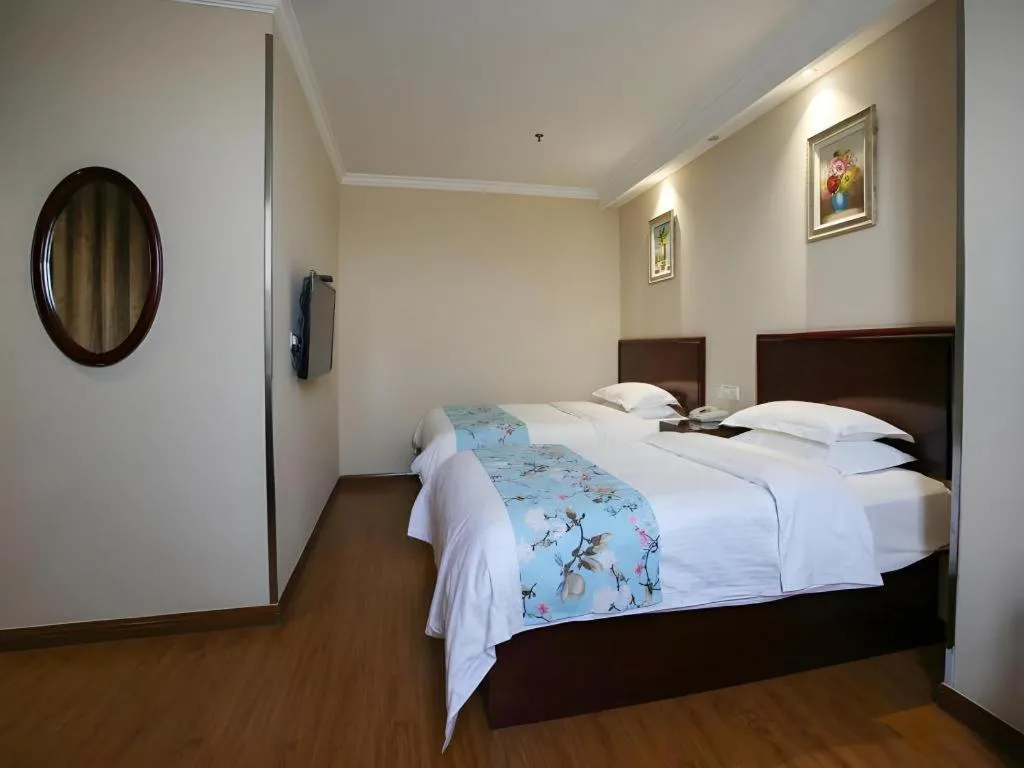 Bed in GreenTree Inn Jiangsu Wuxi Xishan DongTing Erquan East Road XinGuang Newly Estate Express Hotel