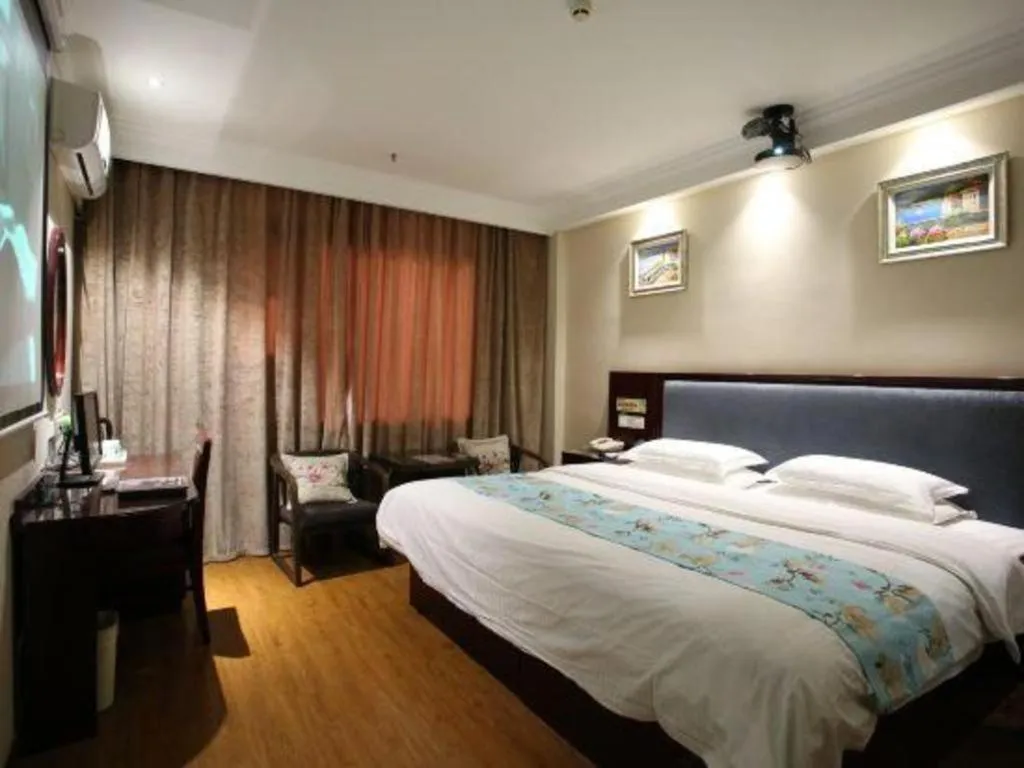 Bed in GreenTree Inn Jiangsu Wuxi Xishan DongTing Erquan East Road XinGuang Newly Estate Express Hotel