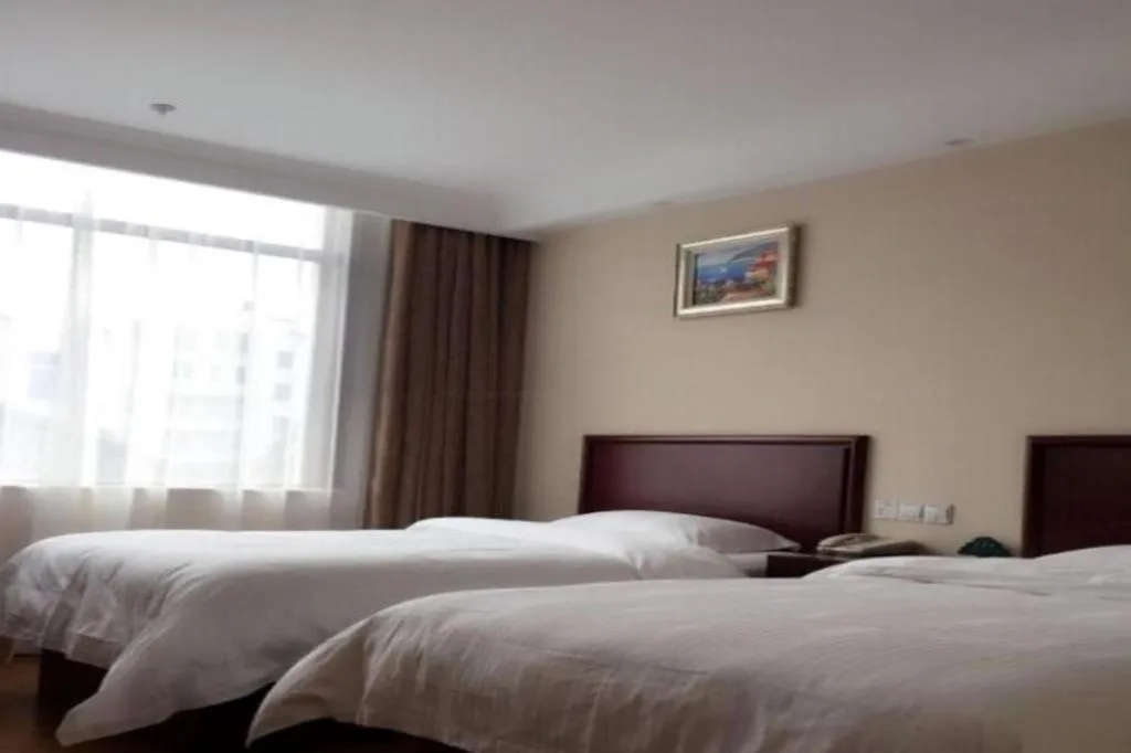 Bed in GreenTree Inn Jiangsu Wuxi Xishan DongTing Erquan East Road XinGuang Newly Estate Express Hotel