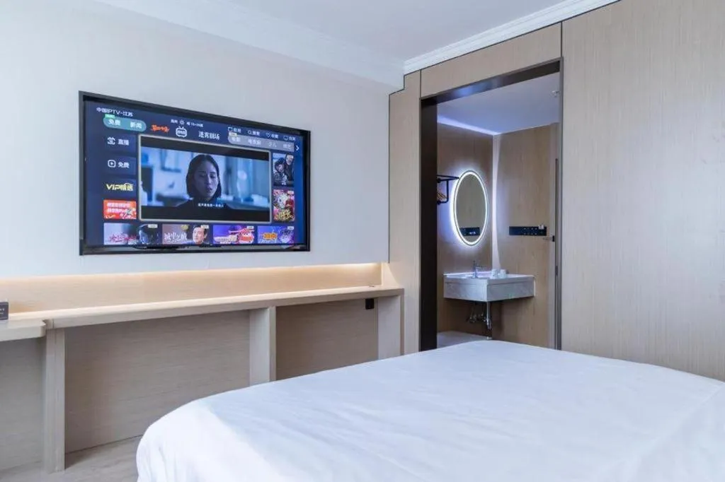 Bed in GreenTree Inn Jiangsu Wuxi Xishan DongTing Erquan East Road XinGuang Newly Estate Express Hotel