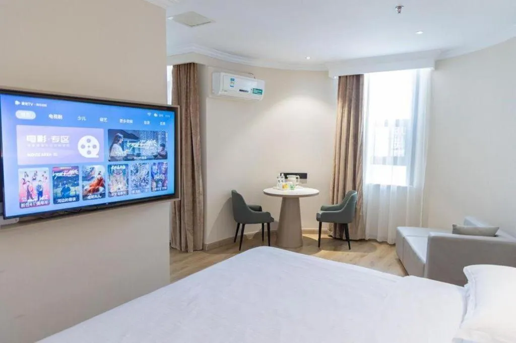 Bed in GreenTree Inn Jiangsu Wuxi Xishan DongTing Erquan East Road XinGuang Newly Estate Express Hotel