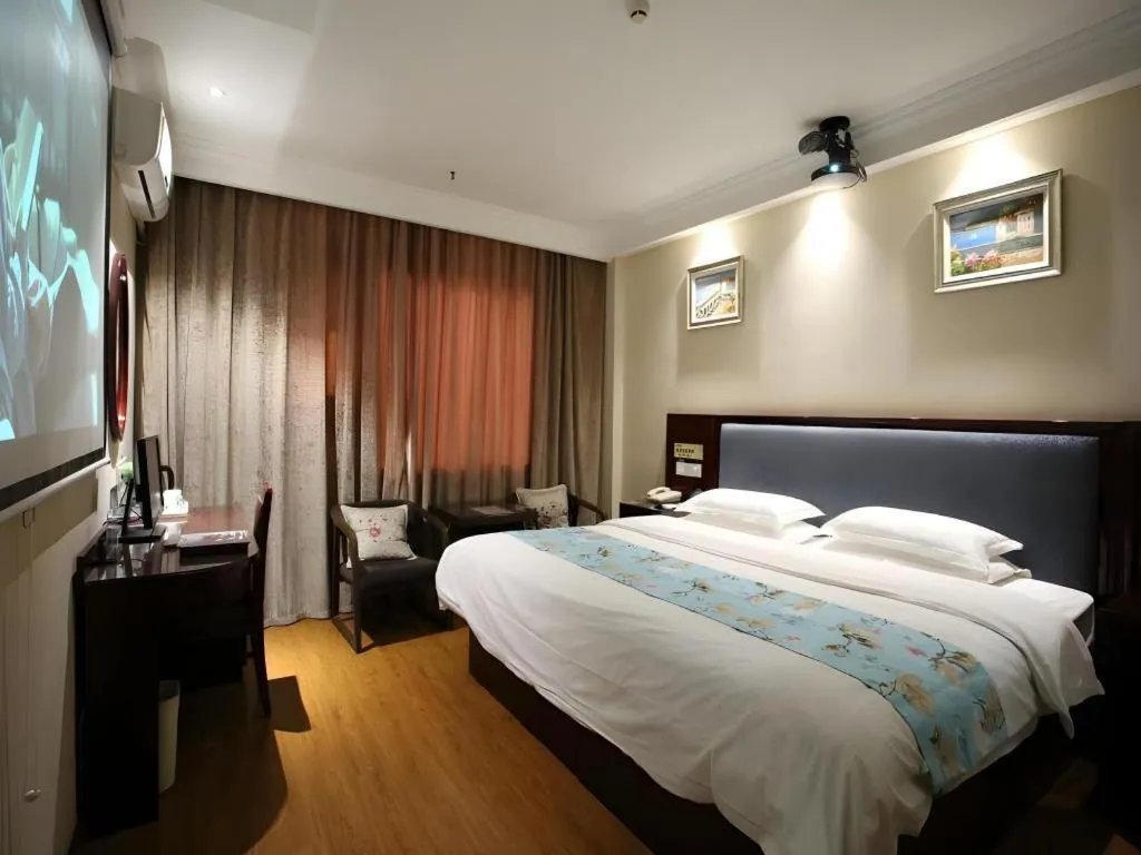 Bed in GreenTree Inn Jiangsu Wuxi Xishan DongTing Erquan East Road XinGuang Newly Estate Express Hotel
