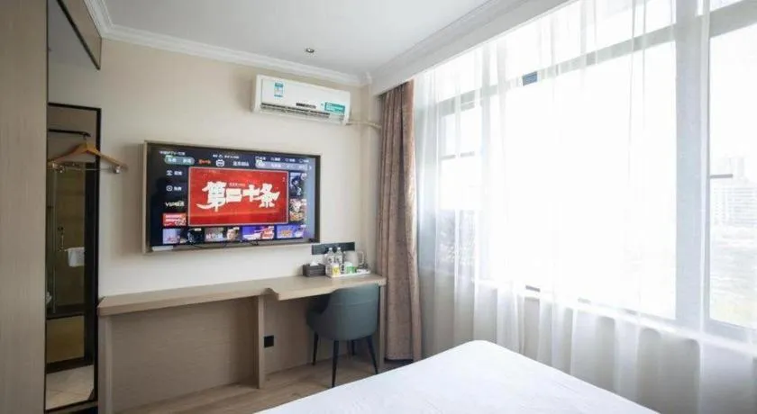 Bed in GreenTree Inn Jiangsu Wuxi Xishan DongTing Erquan East Road XinGuang Newly Estate Express Hotel
