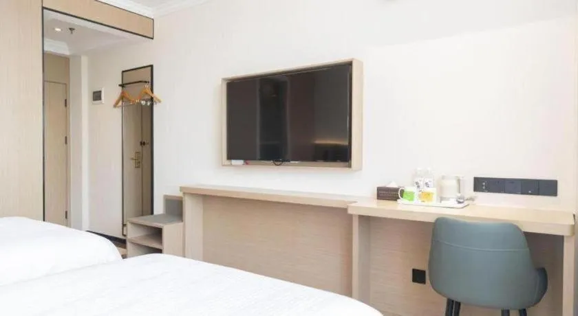 Bed in GreenTree Inn Jiangsu Wuxi Xishan DongTing Erquan East Road XinGuang Newly Estate Express Hotel