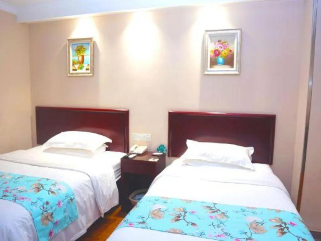 Bed in GreenTree Inn Jiangsu Wuxi Xishan DongTing Erquan East Road XinGuang Newly Estate Express Hotel