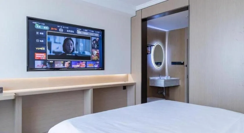 Bed in GreenTree Inn Jiangsu Wuxi Xishan DongTing Erquan East Road XinGuang Newly Estate Express Hotel