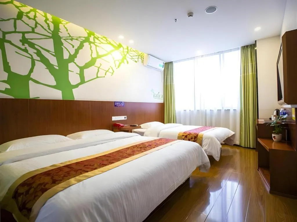 Bed in Vatica ShangHai Pudong Airport Disney Huaxia(E) Road Metro Station Hotel .