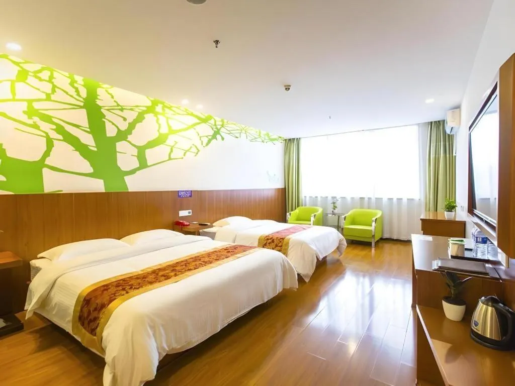 Bed in Vatica ShangHai Pudong Airport Disney Huaxia(E) Road Metro Station Hotel .