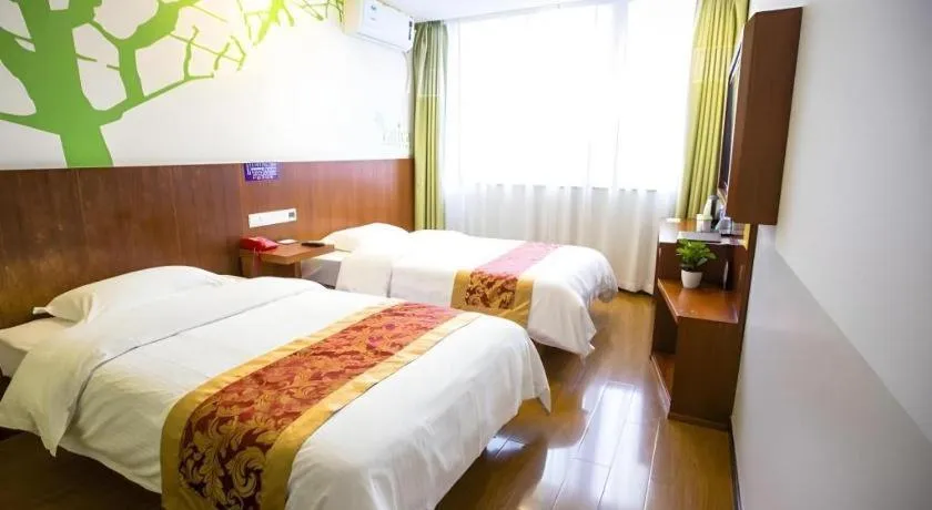 Bed in Vatica ShangHai Pudong Airport Disney Huaxia(E) Road Metro Station Hotel .