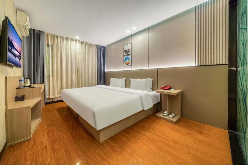 Bed in Vatica ShangHai Pudong Airport Disney Huaxia(E) Road Metro Station Hotel .