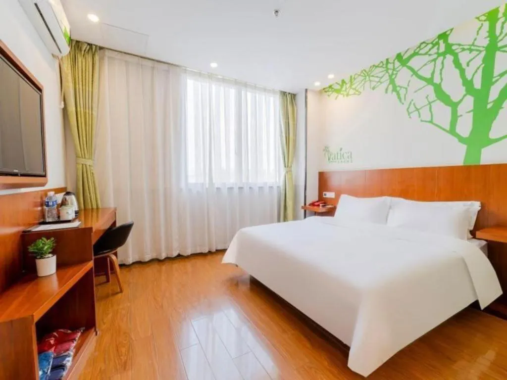 Bed in Vatica ShangHai Pudong Airport Disney Huaxia(E) Road Metro Station Hotel .