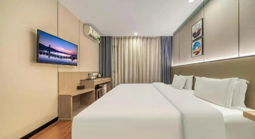 Bed in Vatica ShangHai Pudong Airport Disney Huaxia(E) Road Metro Station Hotel .