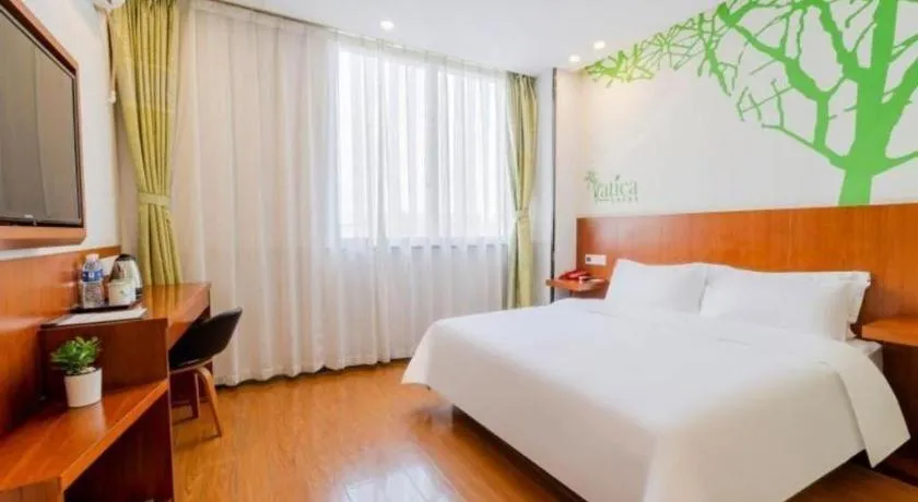 Bed in Vatica ShangHai Pudong Airport Disney Huaxia(E) Road Metro Station Hotel .