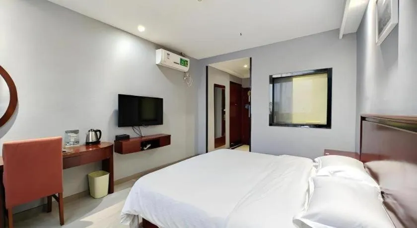 Bed in GreenTree Inn Nanjing Dachang Getang Metro Station Express Hotel