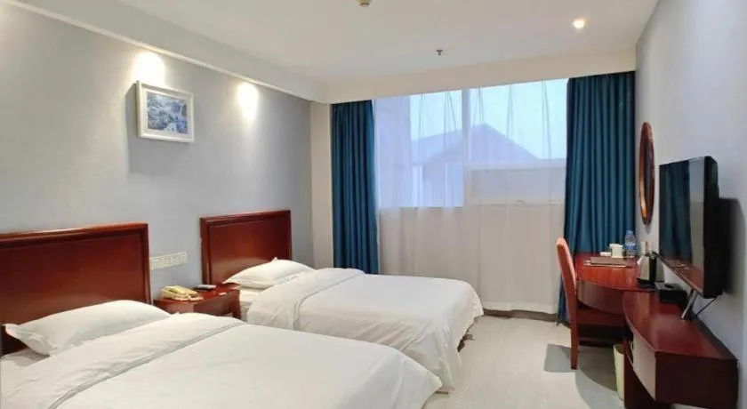 Bed in GreenTree Inn Nanjing Dachang Getang Metro Station Express Hotel