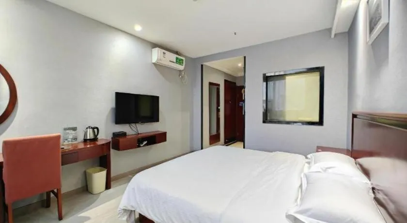 Bed in GreenTree Inn Nanjing Dachang Getang Metro Station Express Hotel