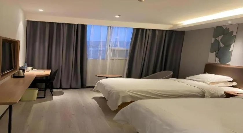 Bed in GreenTree Inn Nanjing Dachang Getang Metro Station Express Hotel