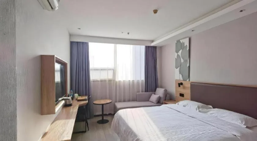 Bed in GreenTree Inn Nanjing Dachang Getang Metro Station Express Hotel