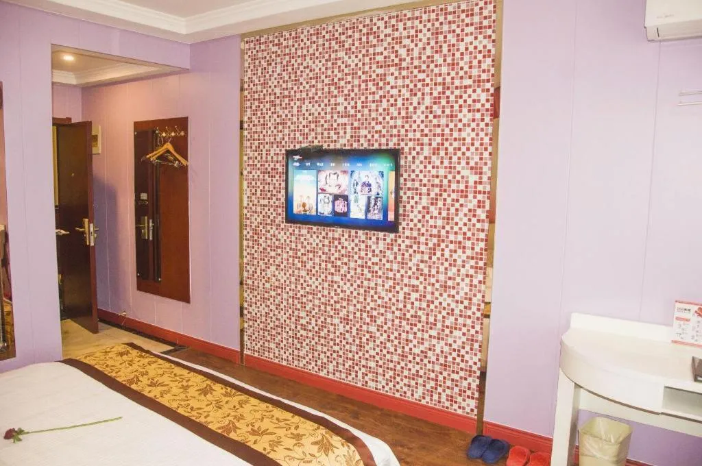 Bed in GreenTree Inn JiangSu Wuxi Jiangyin City QinGYAng Town Fuqian Road Express Hotel