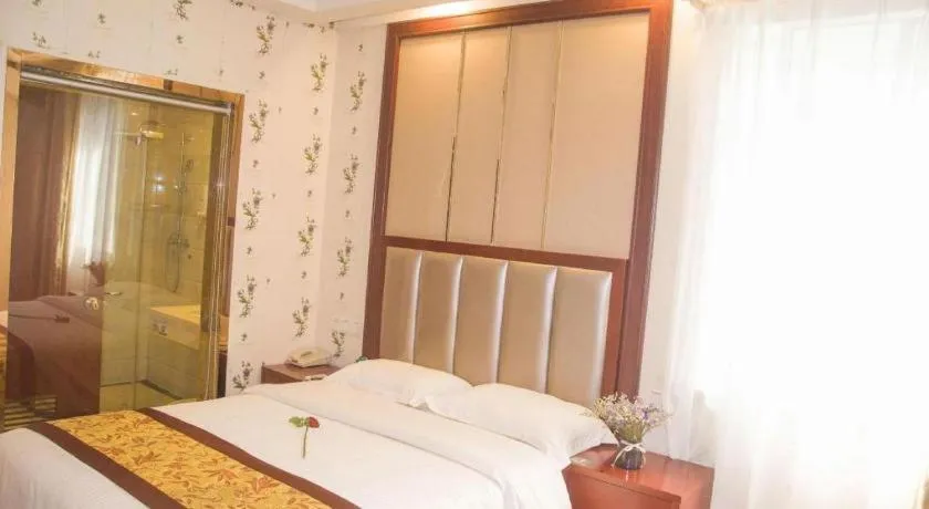 Bed in GreenTree Inn JiangSu Wuxi Jiangyin City QinGYAng Town Fuqian Road Express Hotel