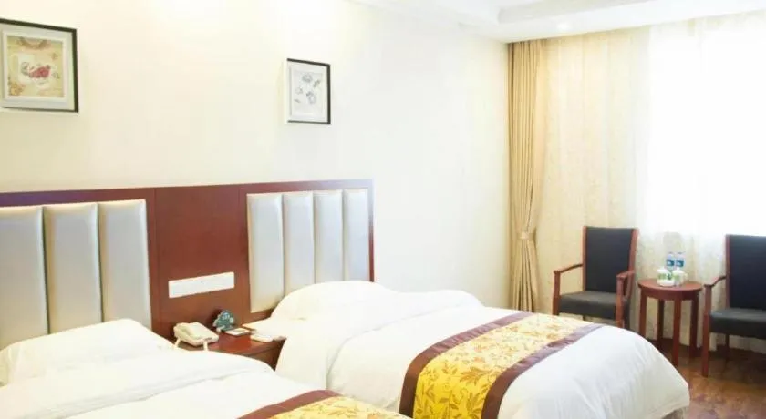 Bed in GreenTree Inn JiangSu Wuxi Jiangyin City QinGYAng Town Fuqian Road Express Hotel