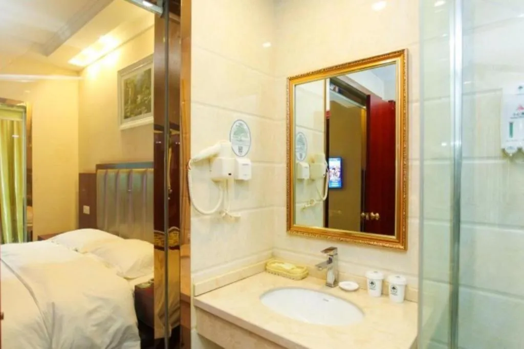 Bed in GreenTree Inn JiangSu Wuxi Jiangyin City QinGYAng Town Fuqian Road Express Hotel