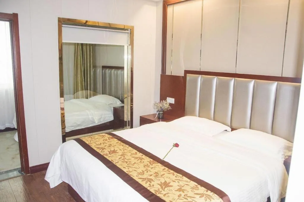 Bed in GreenTree Inn JiangSu Wuxi Jiangyin City QinGYAng Town Fuqian Road Express Hotel