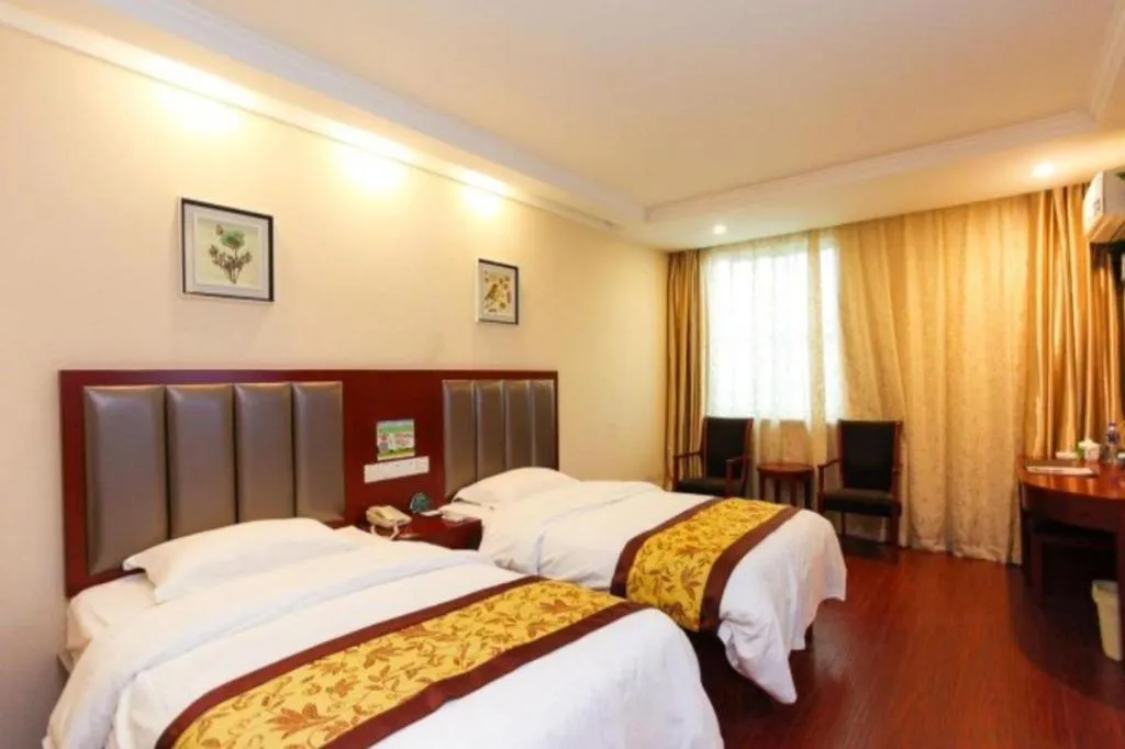Bed in GreenTree Inn JiangSu Wuxi Jiangyin City QinGYAng Town Fuqian Road Express Hotel