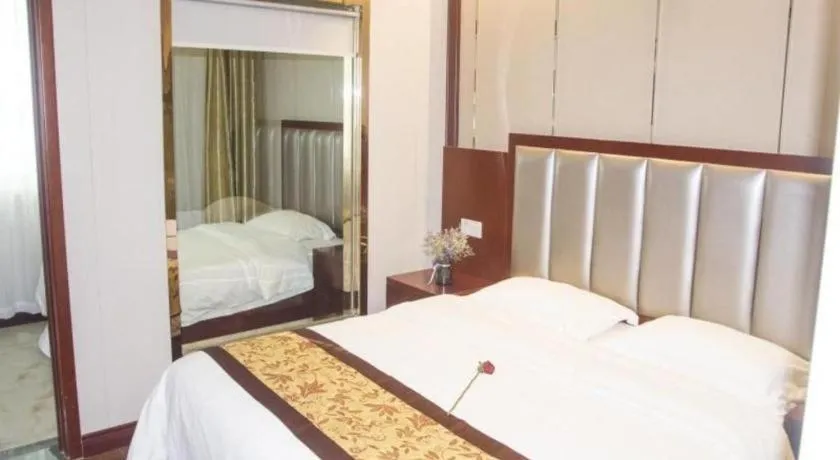 Bed in GreenTree Inn JiangSu Wuxi Jiangyin City QinGYAng Town Fuqian Road Express Hotel