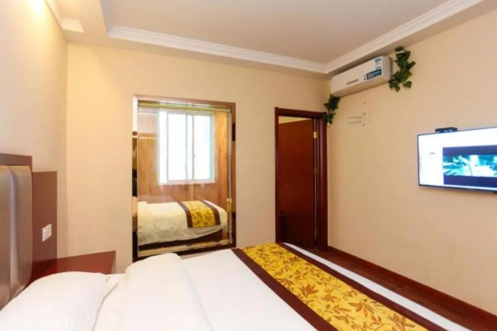 Bed in GreenTree Inn JiangSu Wuxi Jiangyin City QinGYAng Town Fuqian Road Express Hotel