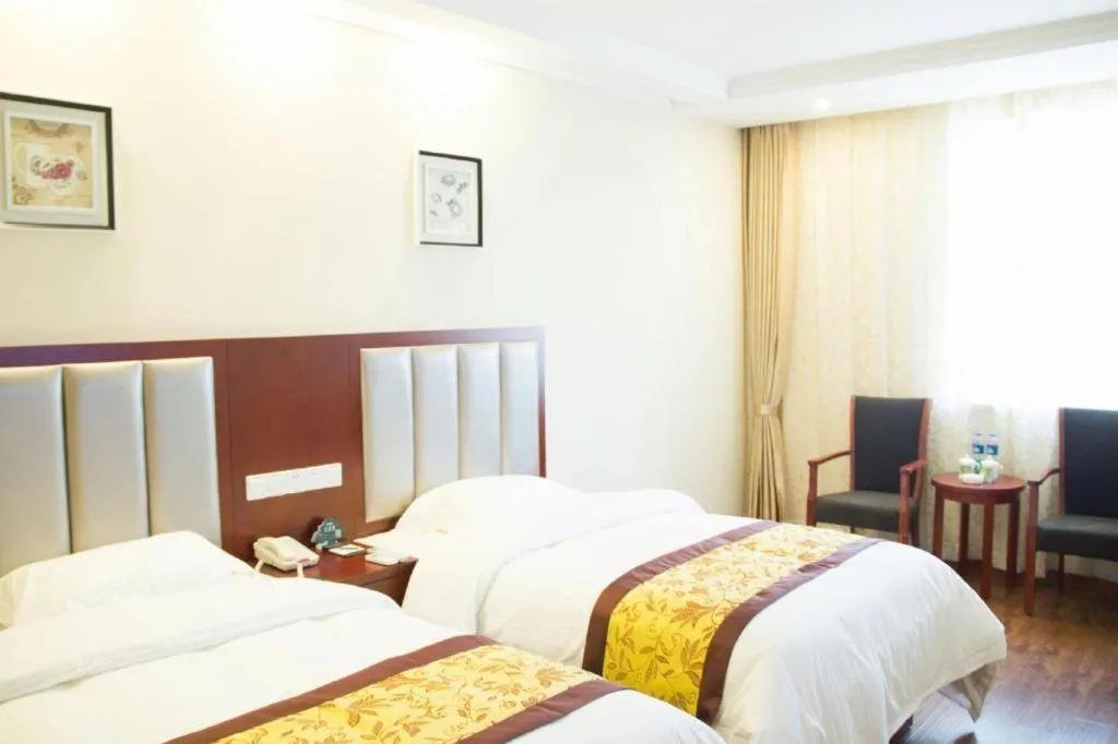 Bed in GreenTree Inn JiangSu Wuxi Jiangyin City QinGYAng Town Fuqian Road Express Hotel