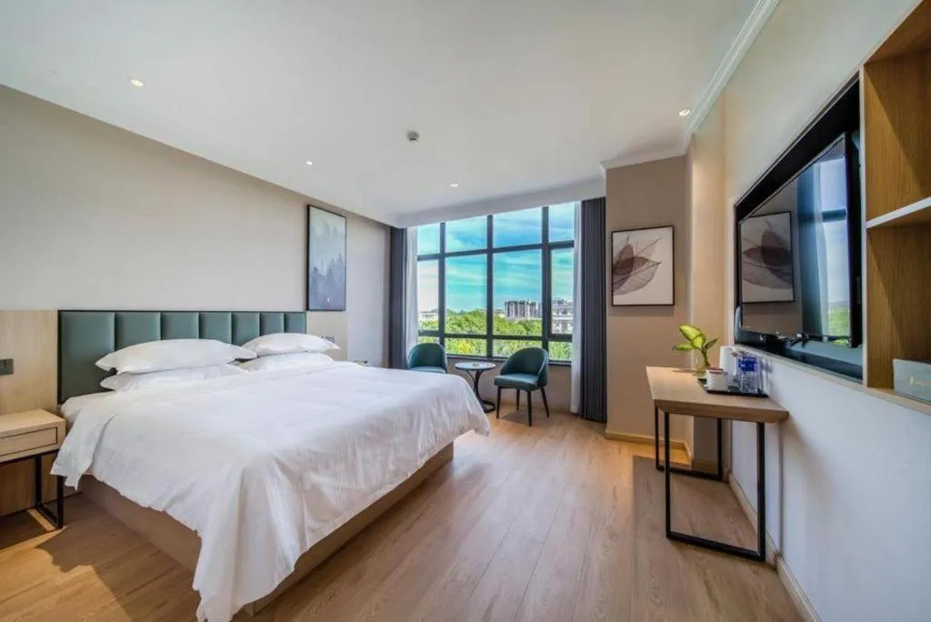 Bed in GreenTree Inn Chizhou Pingtian Lake Qingfeng Avenue Business Hotel