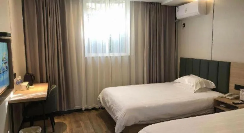 Bed in GreenTree Inn Yangzhou Slender West Lake Wencheng Attic Express Hotel