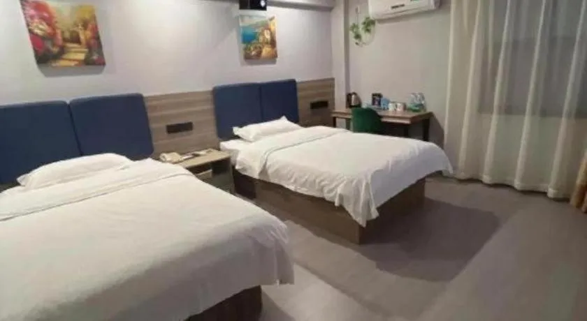 Bed in GreenTree Inn Shanghai MinHang ZhuanQiao Subway Station East ZhuanXing Road Shell Hotel