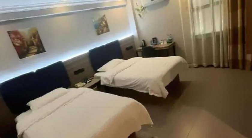 Bed in GreenTree Inn Shanghai MinHang ZhuanQiao Subway Station East ZhuanXing Road Shell Hotel