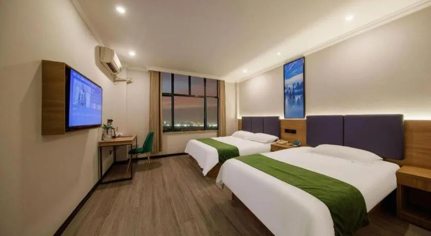 Bed in GreenTree Inn Shanghai MinHang ZhuanQiao Subway Station East ZhuanXing Road Shell Hotel