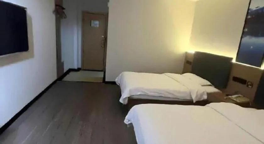 Bed in GreenTree Inn Shanghai MinHang ZhuanQiao Subway Station East ZhuanXing Road Shell Hotel