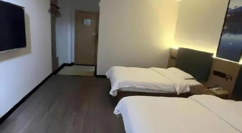 Bed in GreenTree Inn Shanghai MinHang ZhuanQiao Subway Station East ZhuanXing Road Shell Hotel