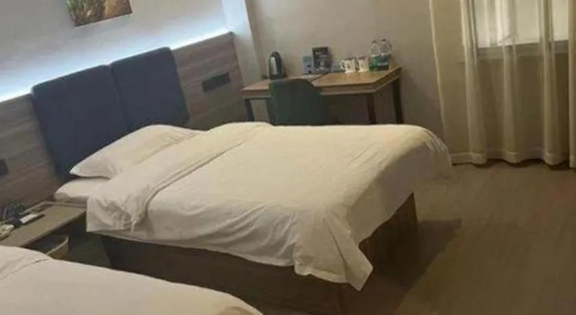 Bed in GreenTree Inn Shanghai MinHang ZhuanQiao Subway Station East ZhuanXing Road Shell Hotel