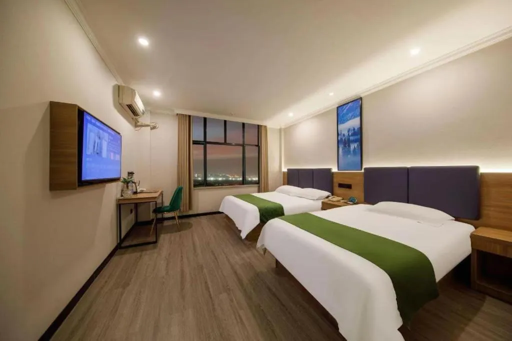 Bed in GreenTree Inn Shanghai MinHang ZhuanQiao Subway Station East ZhuanXing Road Shell Hotel
