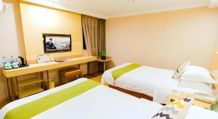 Bed in GreenTree Inn Shanghai Guangxin Road Tongji Hospital Express Hotel