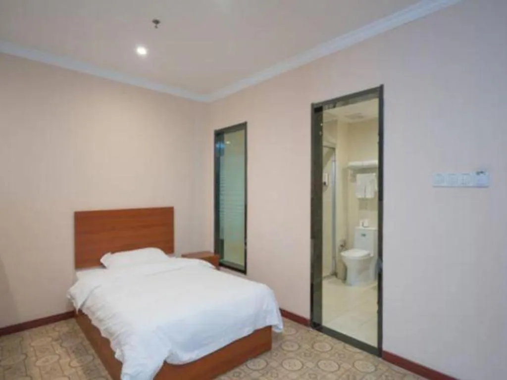 Bed in GreenTree Inn Wuhu Fangte Second Phase Nanxiang Wanshang Express Hotel