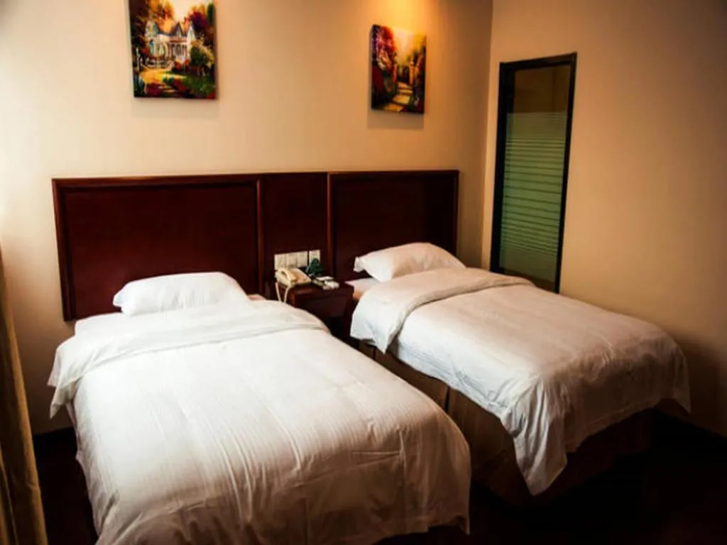 Bed in GreenTree Inn Wuhu Fangte Second Phase Nanxiang Wanshang Express Hotel