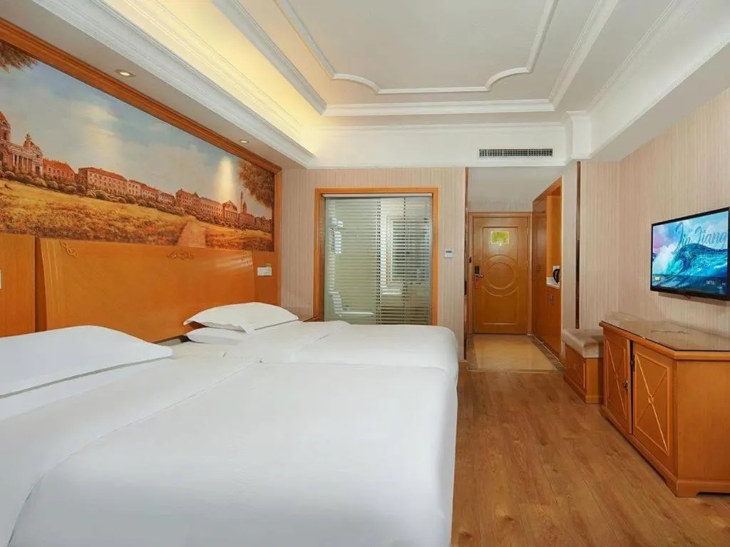 Bed in Vienna International Hotel Lhasa Potala Palace