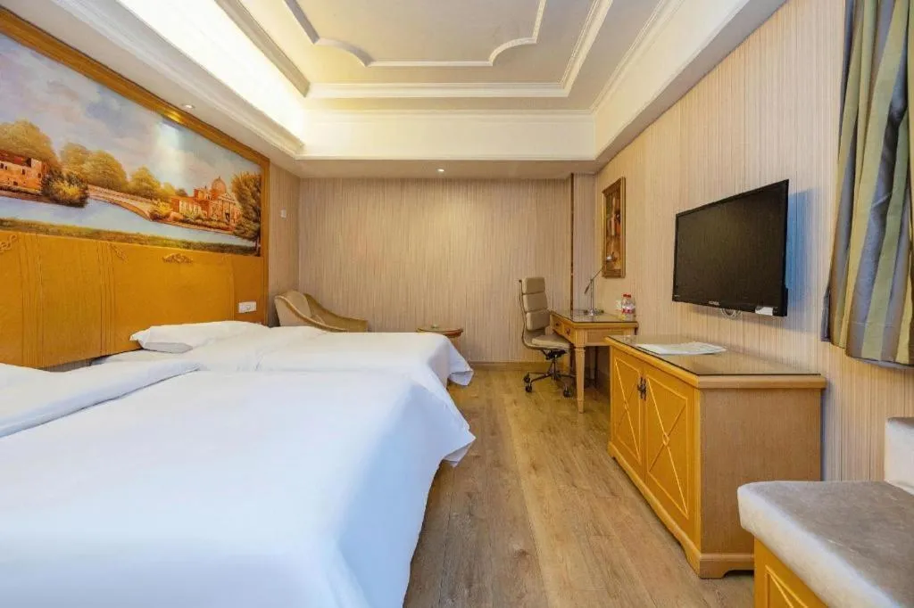 Bed in Vienna International Hotel Lhasa Potala Palace