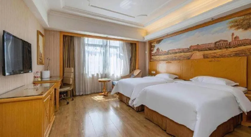 Bed in Vienna International Hotel Lhasa Potala Palace