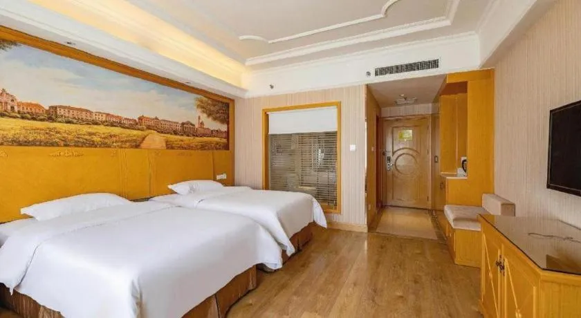 Bed in Vienna International Hotel Lhasa Potala Palace